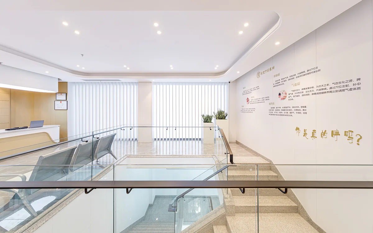 Bright upper-floor landing inside the Shanghai venue